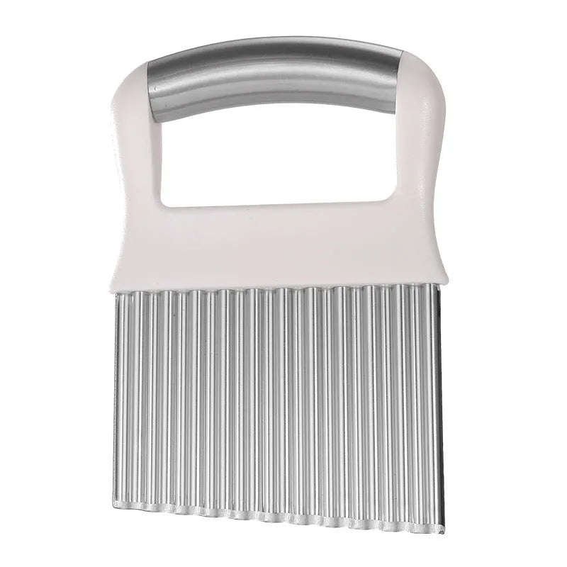 Stainless steel potato wave crinkle cutter knife on a kitchen worktop.