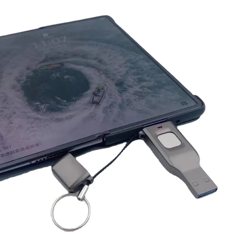 Black metal fingerprint encrypted USB flash drive with USB 3.0 and USB-C connectors.