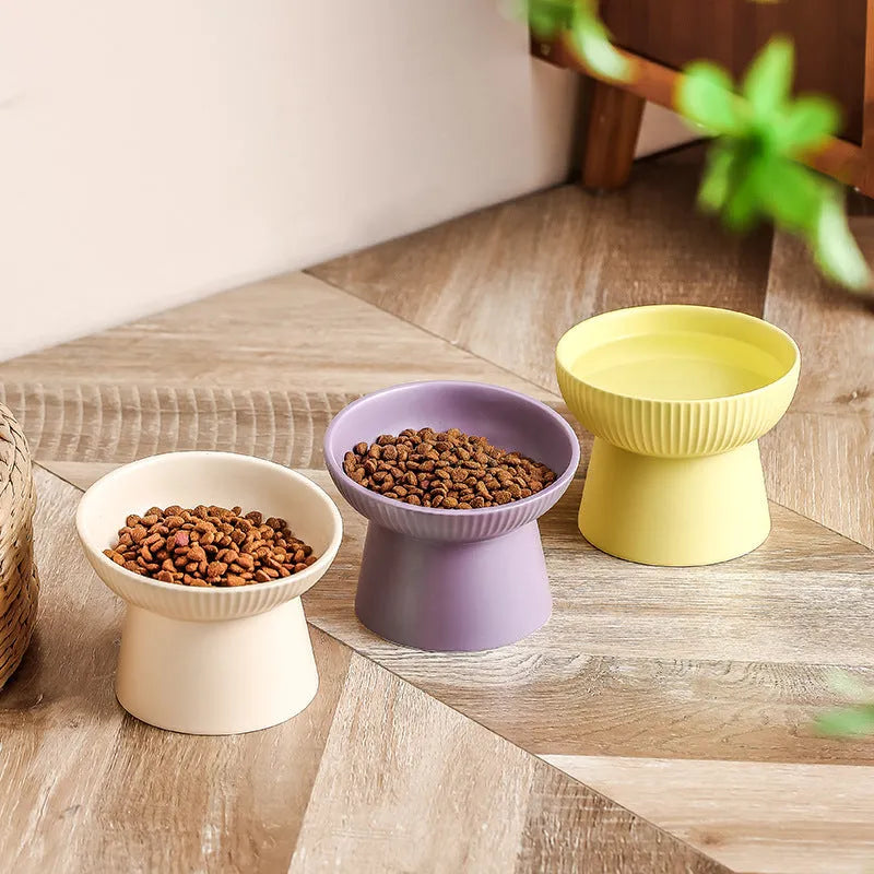 Striped oblique matte purple anti-tumble porcelain cat goblet rice bowl on a light background