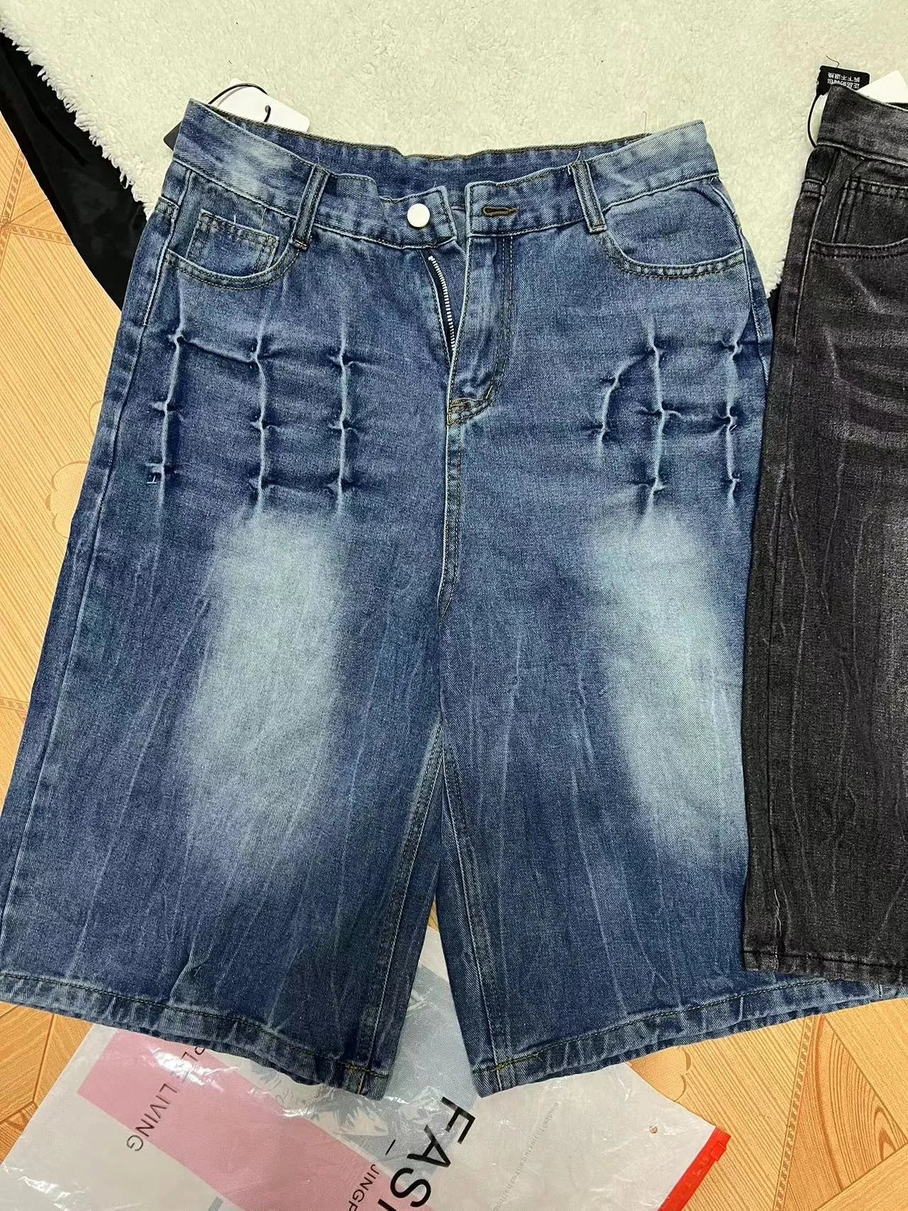 Men's loose straight-leg washed denim shorts in blue, mid waist with zip placket, for casual summer wear.