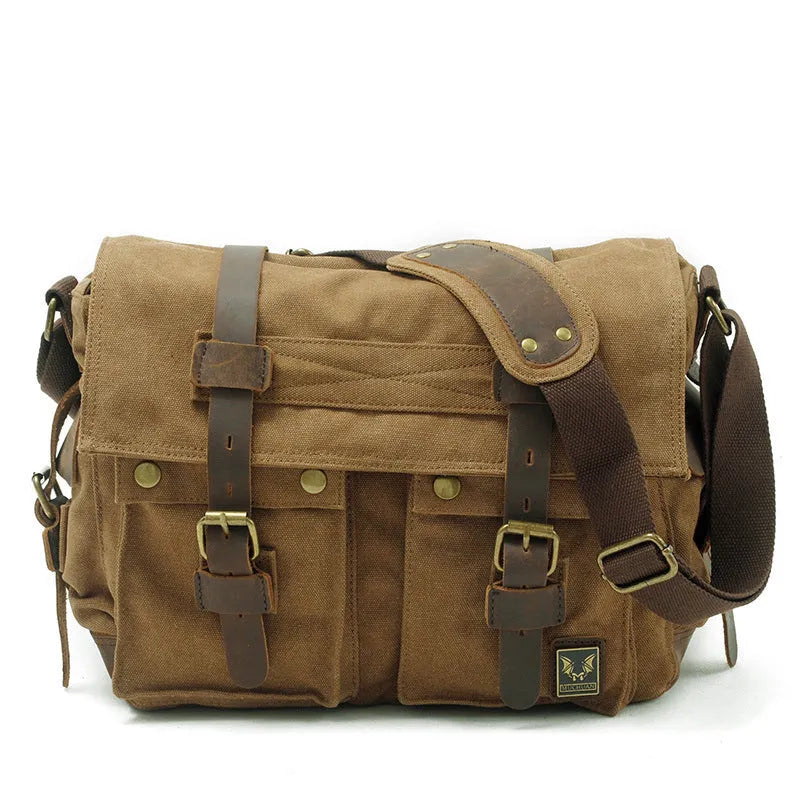 Men's canvas crossbody shoulder bag with cowhide trim in retro styling showing flap closure and single strap