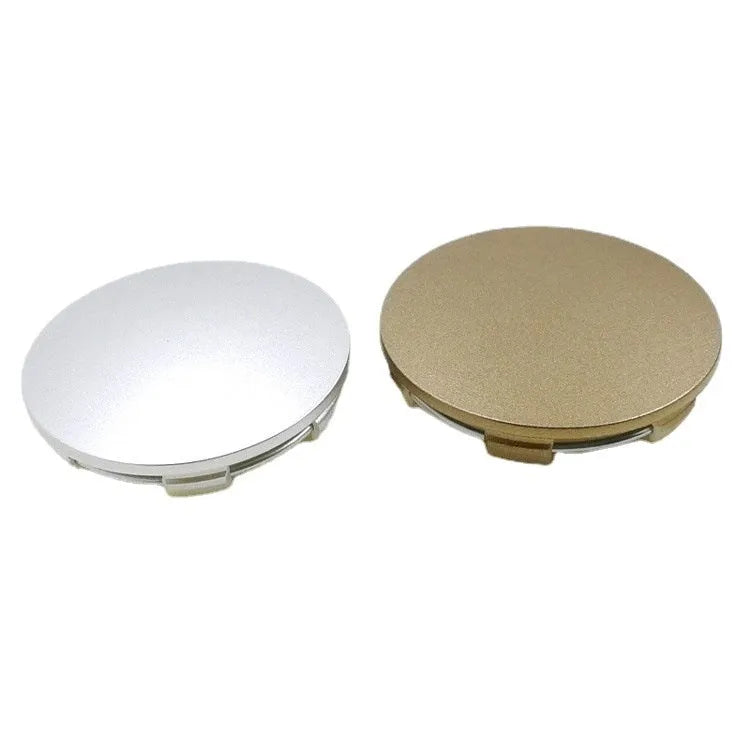 65mm diameter ABS plastic car hub centre cover in antique copper finish with aluminium label.
