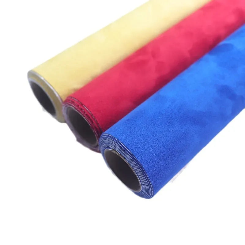 Roll of self-adhesive leather suede in a colour swatch showing multiple options like black, brown, blue, and red.