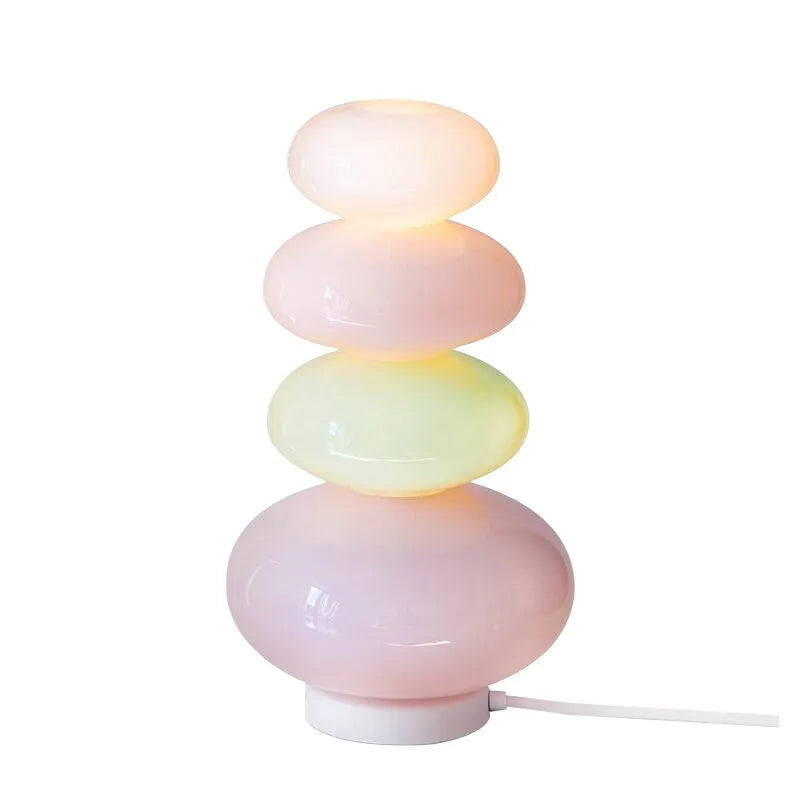 Candy String Rainbow Floor Lamp in creative macaron style with glass shade and iron body on a wooden table