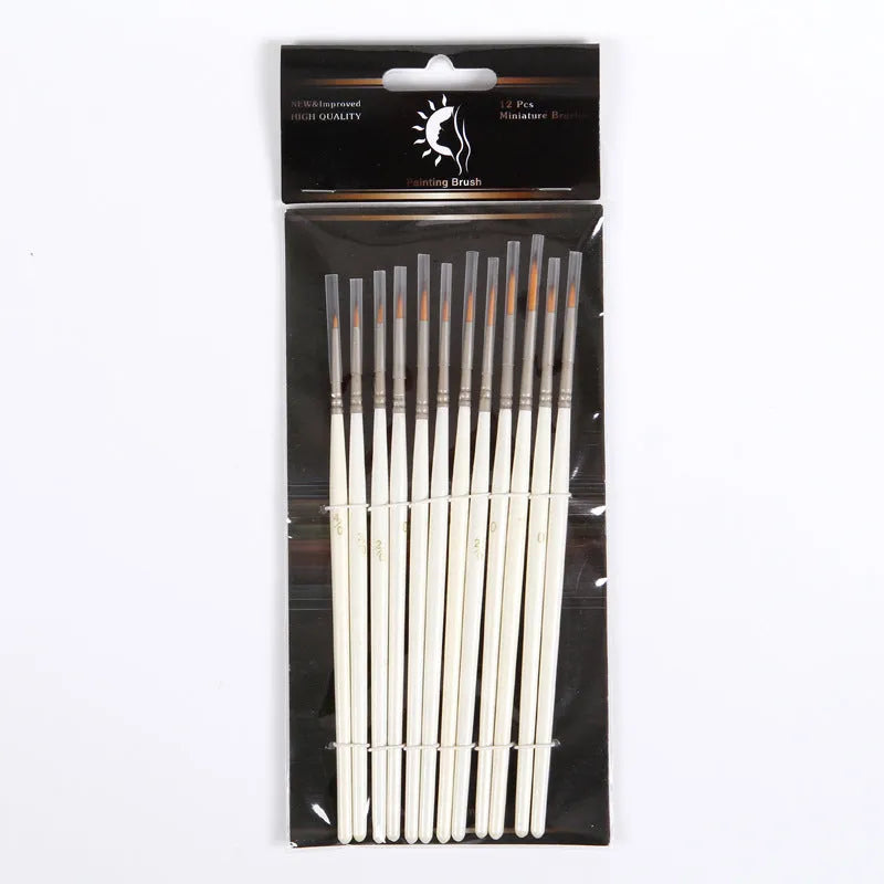 A 12-piece set of Pearl White artist brushes with a solid wood pen holder.