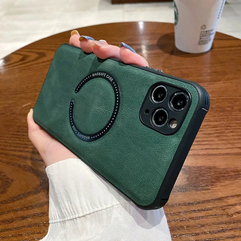 Black imitation leather magnetic charging case for Apple iPhone on a table.