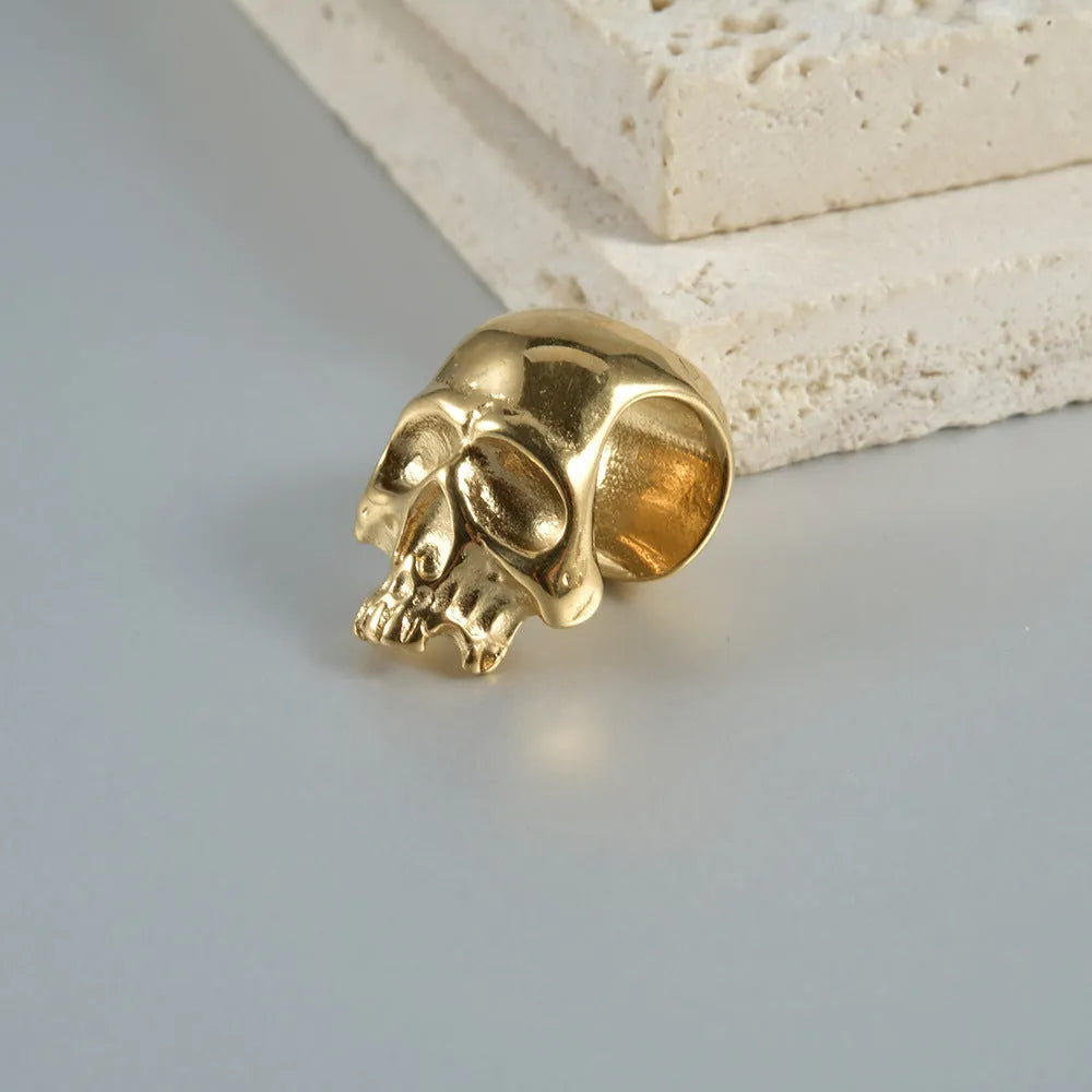 Stainless steel hollow skull Buddha earrings with electroplated colour options