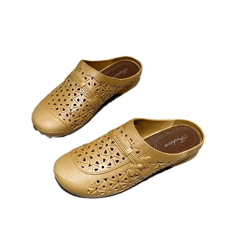 Women's apricot fairy style PVC half slippers with hollow-out design and flat toe box.