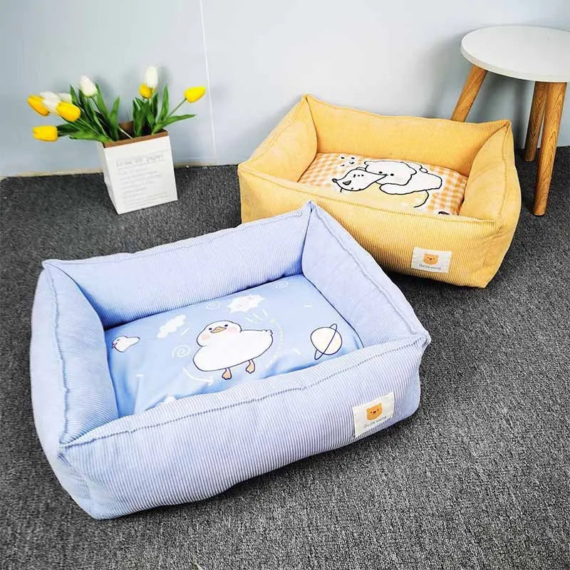 Square cloth pet bed with printed fabric finish, shown in one of five colours and available in 40x50cm or 50x60cm