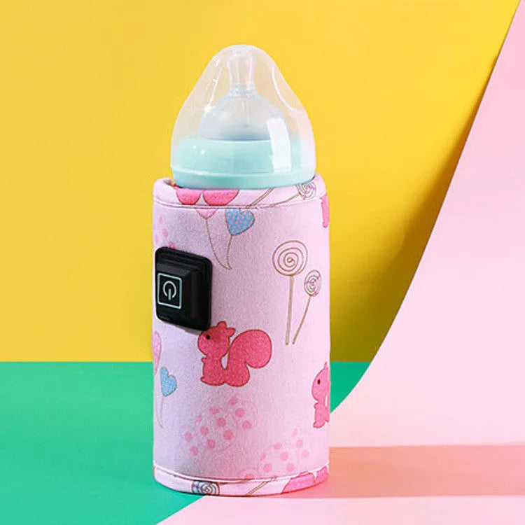 USB-powered portable baby bottle warmer bag in blue dinosaur cartoon print.