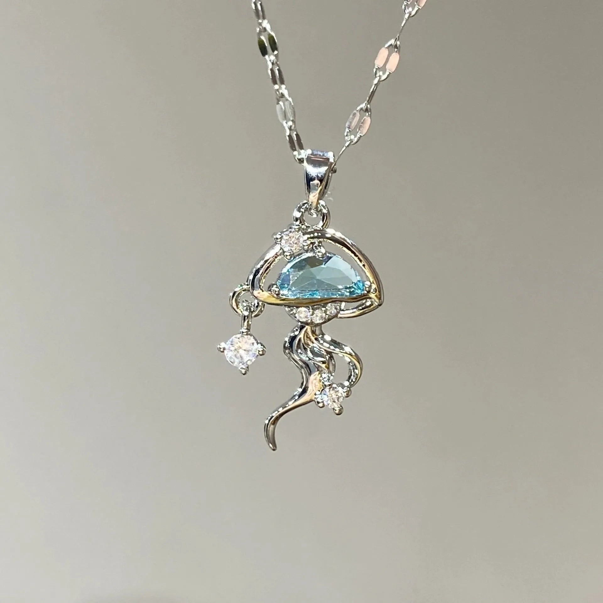 S925 sterling silver blue jellyfish necklace with white gold colour finish on adjustable chain