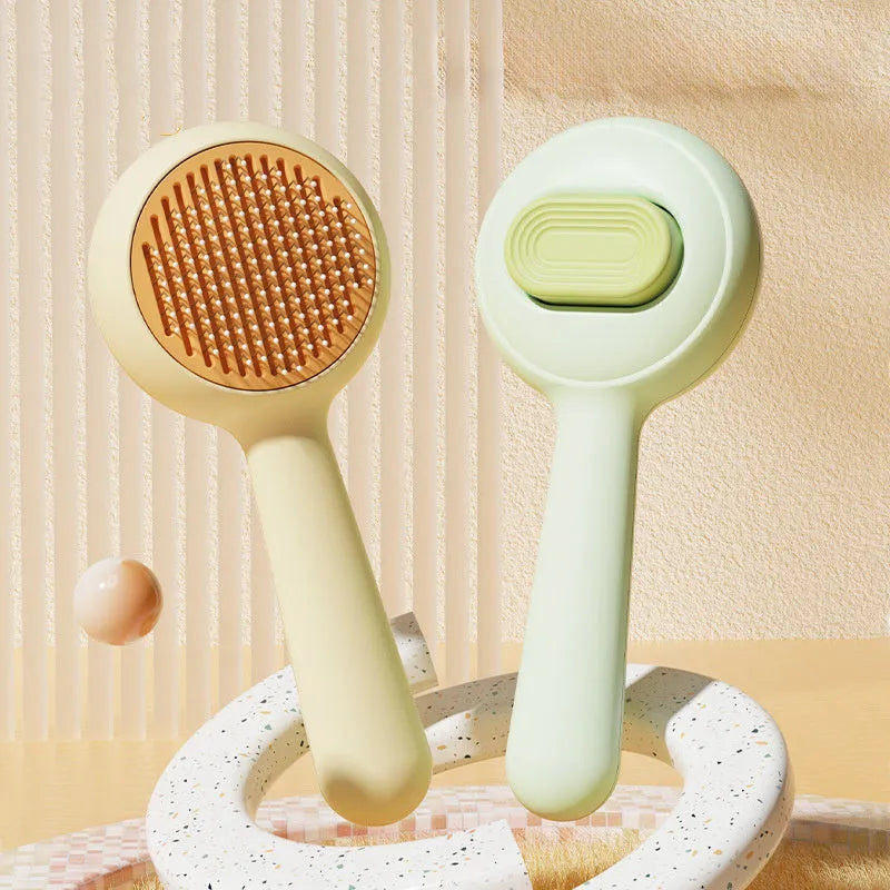 Stainless steel pet grooming comb with non-slip handle in green or yellow colour