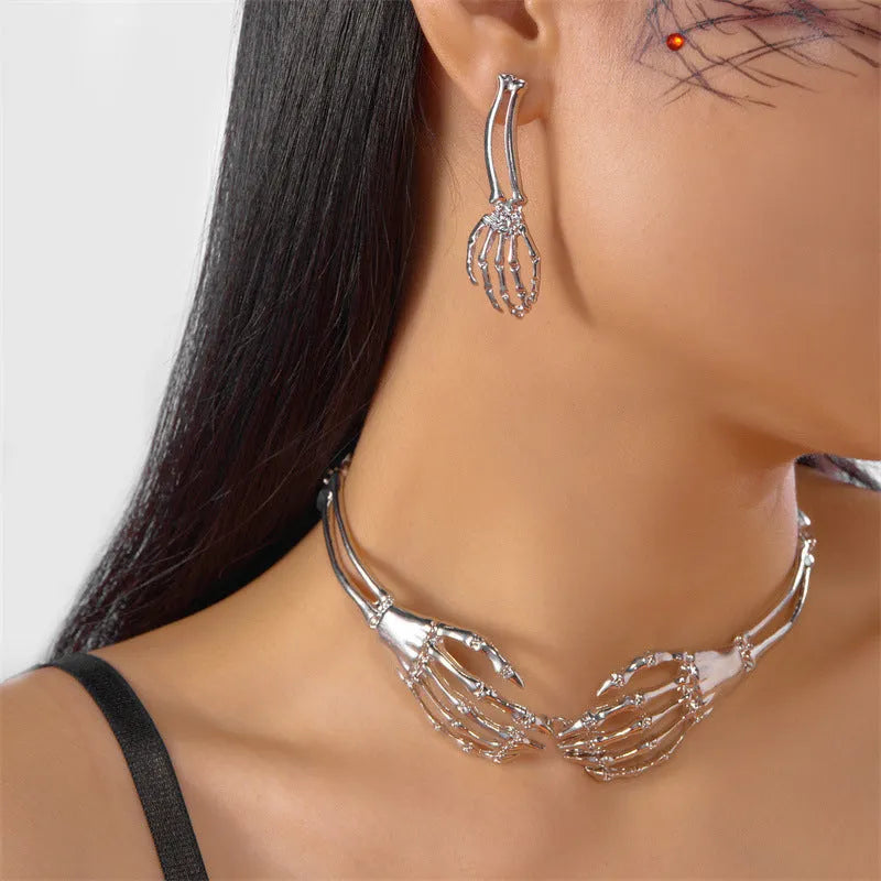 Dark style alloy skull and ghost claw necklace and earrings set for women with electroplated finish
