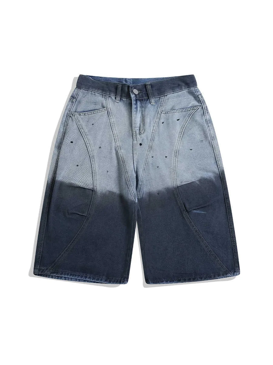 Blue tie-dye gradient cropped jeans with a washed-out finish and loose fit.