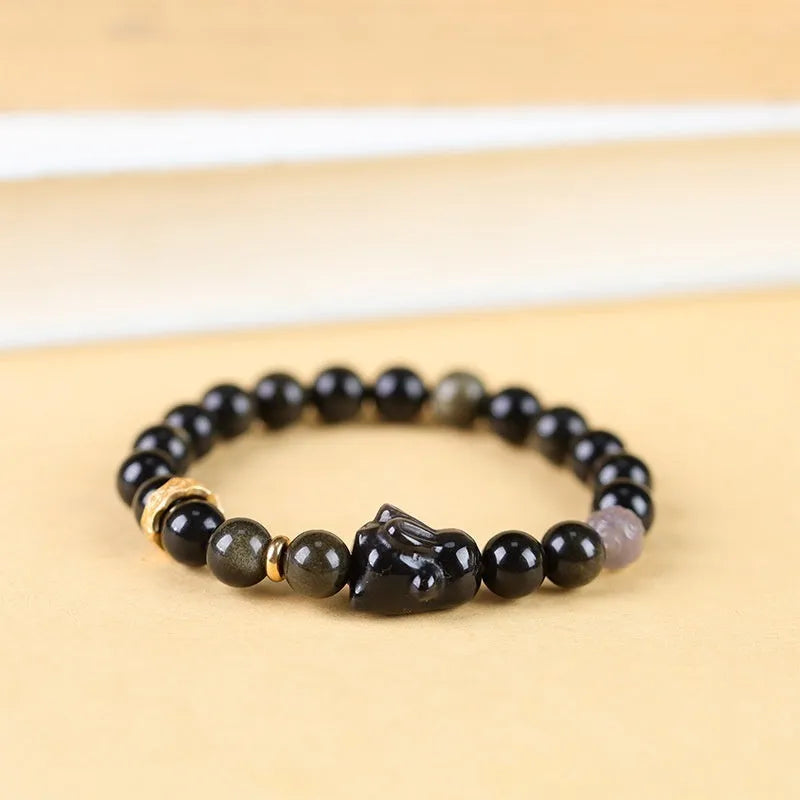 Handmade lying rabbit obsidian bracelet with brass charm and grey agate beads in two sizes