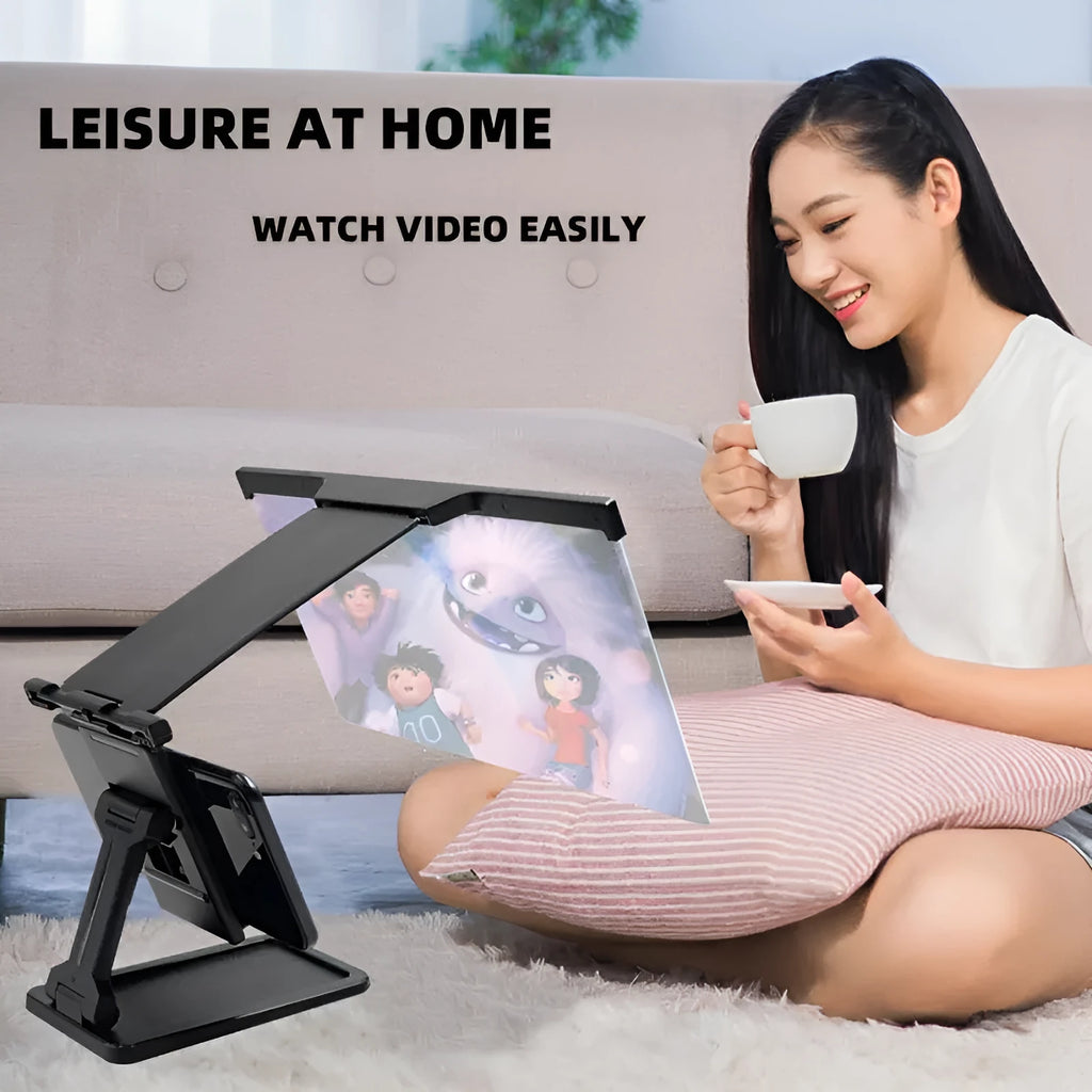 Black 12 inch mobile phone screen amplifier with detachable phone holder on desktop
