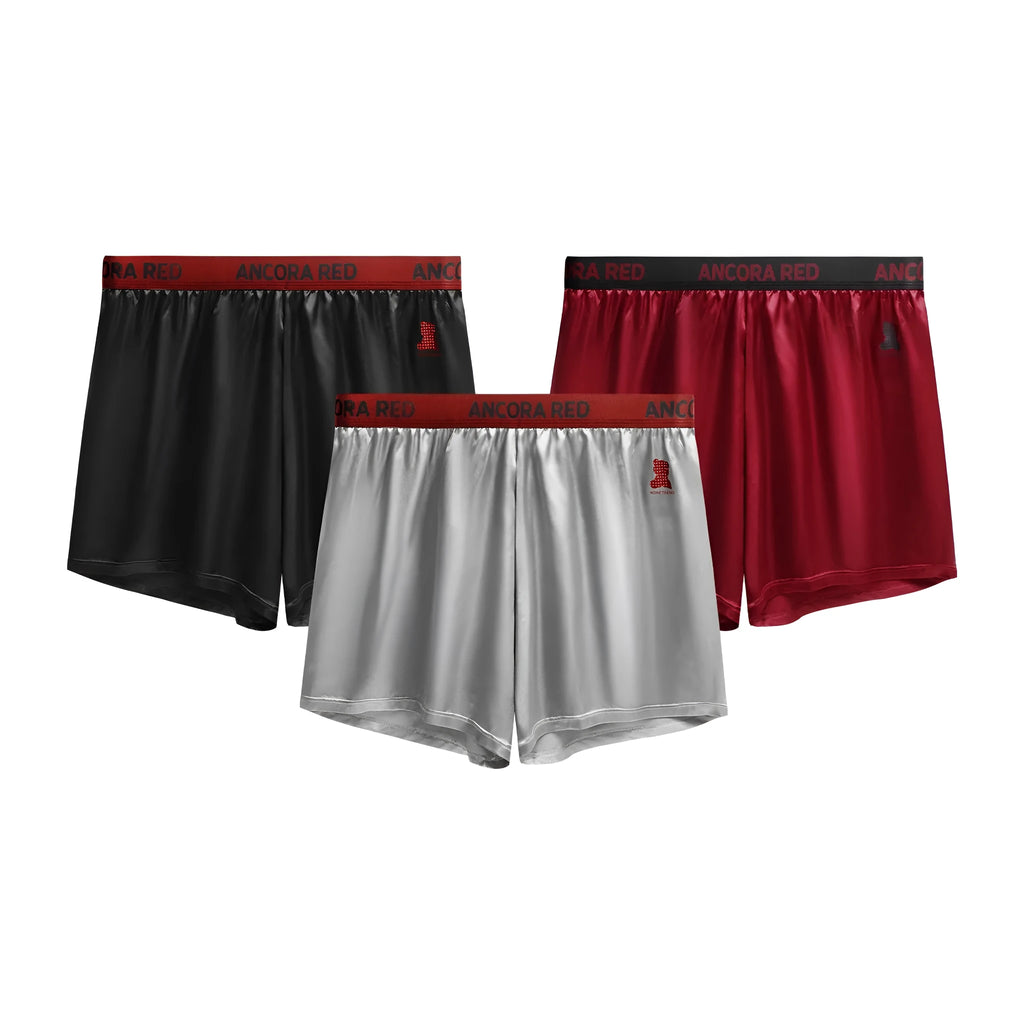 Men's solid colour polyester boxer briefs on a white background, showing the mid-waist design.