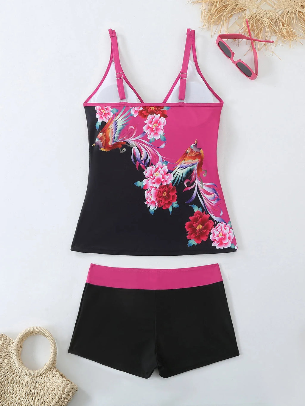 Women's plus size printed swimsuit in black or rose red, shown in briefs style.