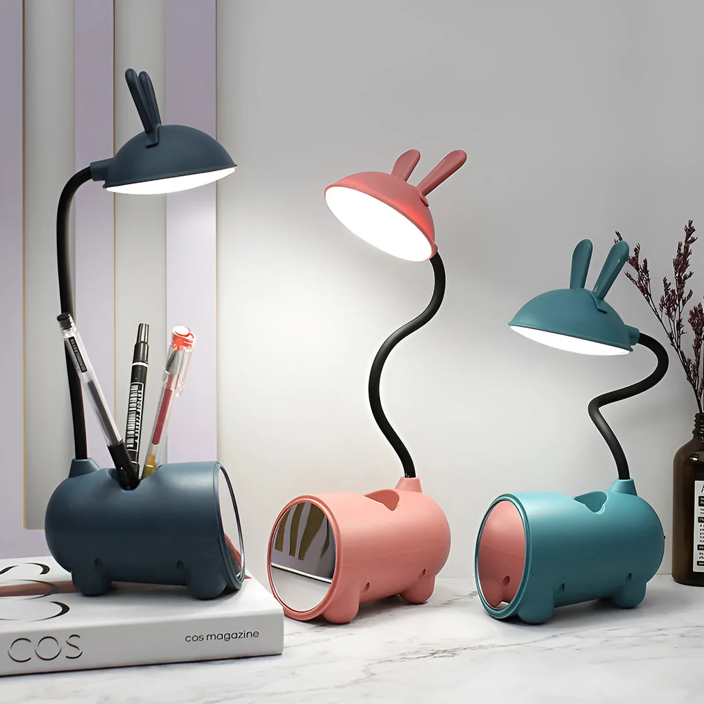 Cartoon USB desk lamp with pen storage container in dark blue colour on desktop