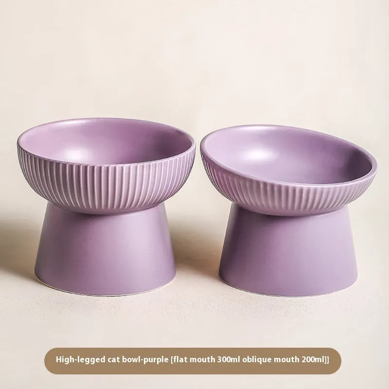 Striped oblique matte purple anti-tumble porcelain cat goblet rice bowl on a light background