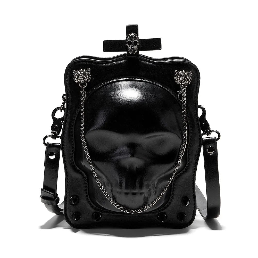 Black mini square crossbody bag with 3D embossed skull design, stitching, and chain detailing
