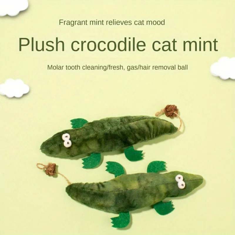 Green plush alligator cat toy with catnip and peppermint scent for oral cleansing and play.