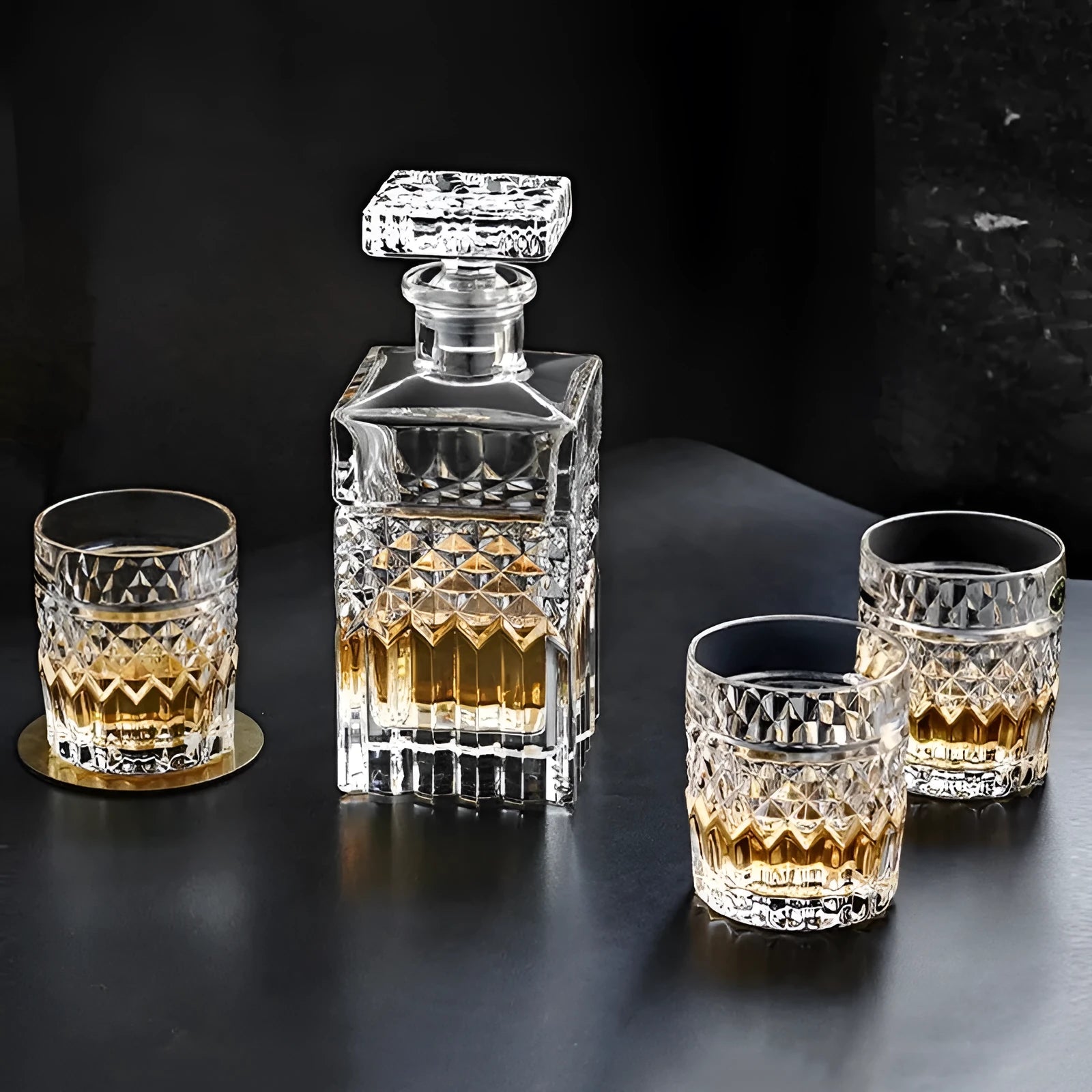 Crystal glass wine set with retro style cups and bottle on table