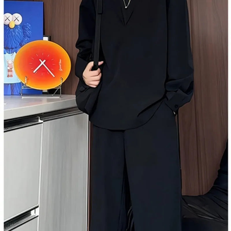 Men's black casual two-piece suit with long sleeve polo shirt and matching trousers slim fit