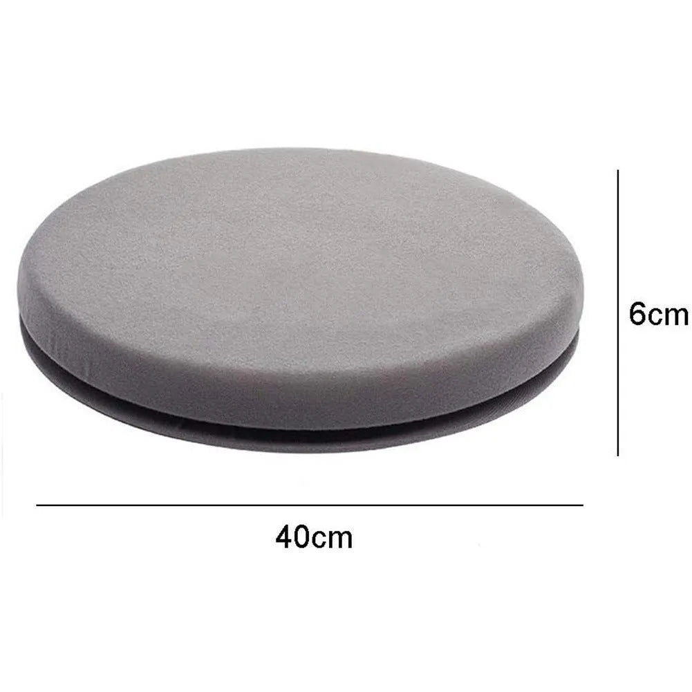 Grey circular car seat cushion with 360-degree rotation feature on a car seat