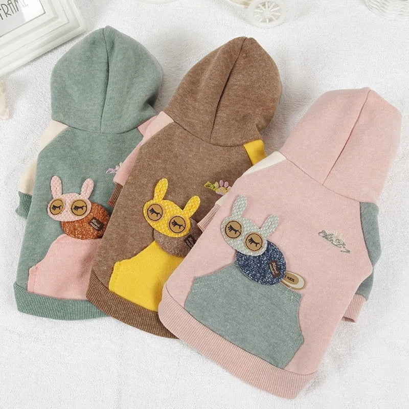 A brown cotton dog sweatshirt shown on a mannequin, with size tags for XS to 2XL.