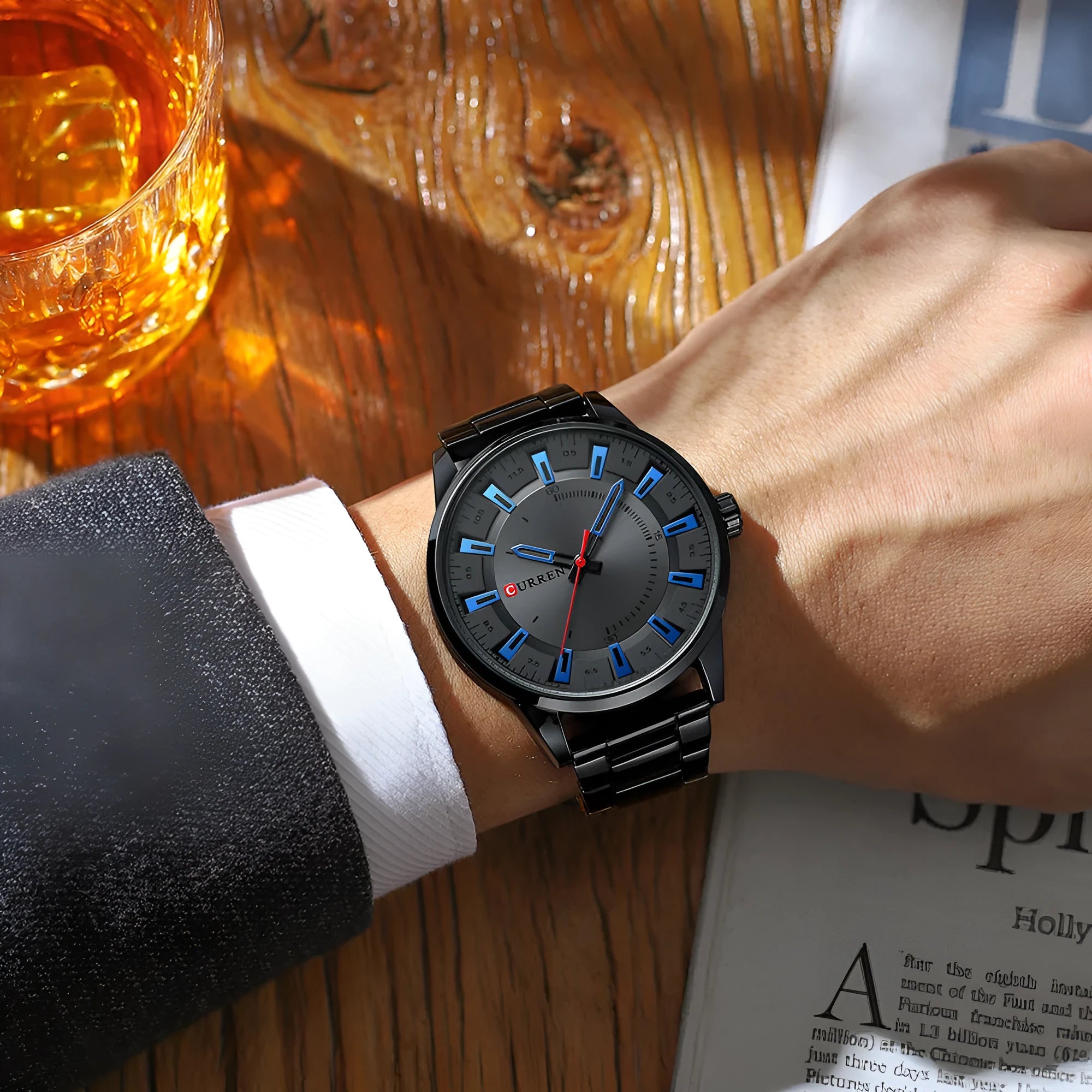 Men's business quartz watch with silver stainless steel strap and blue white scale dial on wrist