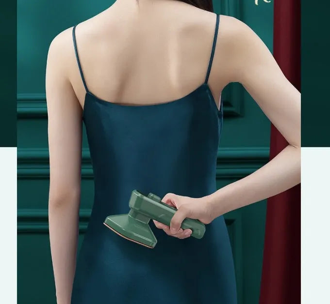 Dark green portable hanging steam iron with ceramic panel and handheld design