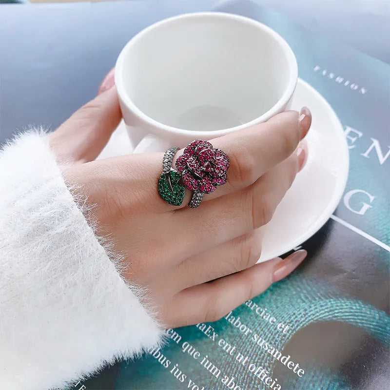Geometric black gold ring with red corundum stone for women, gold-plated copper construction