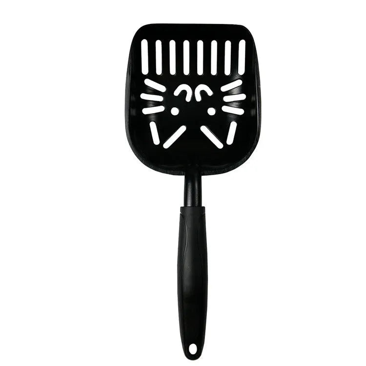 Alloy cat litter scoop with plastic handle on a cat litter box, showing cat face hole design for sifting.