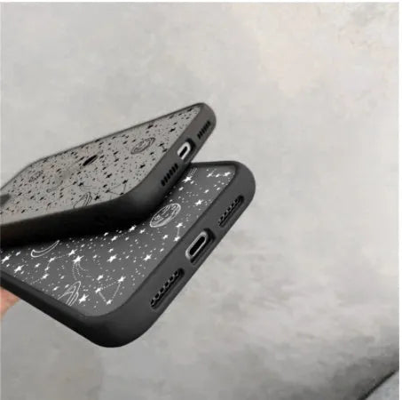 Clear mobile phone case with black frame and integrated screen cover for iPhone, showing blue light filter feature.