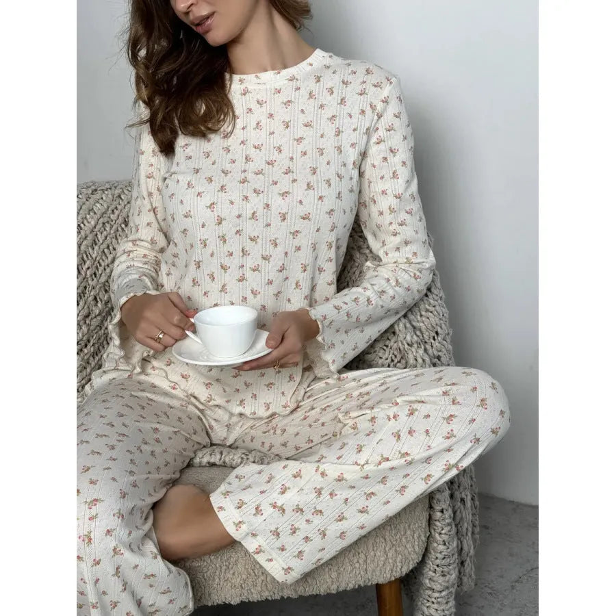 Women's white floral print lounge suit with bell sleeve top and wide-leg trousers