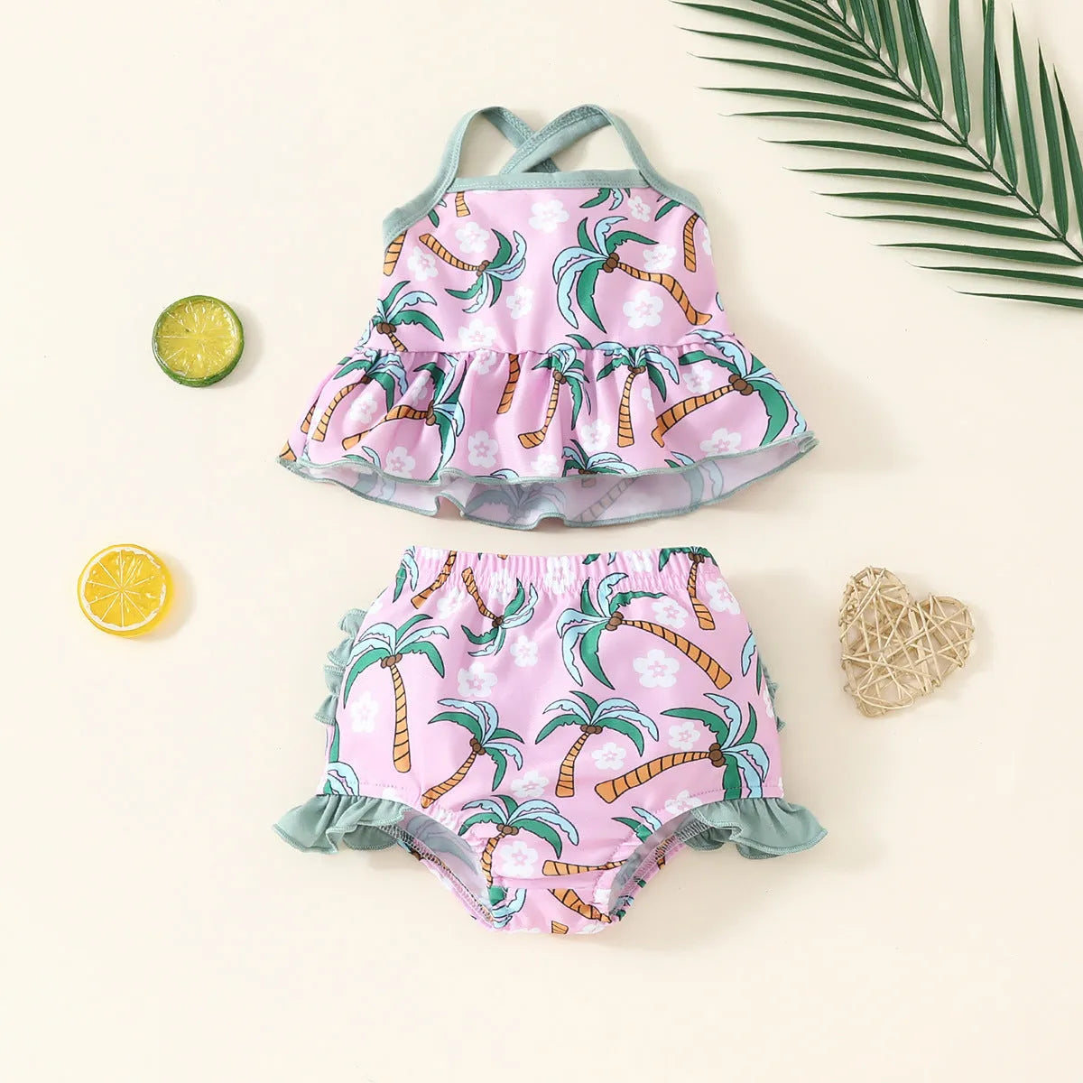White children's two-piece swimsuit set with shirt and beach shorts for toddlers.