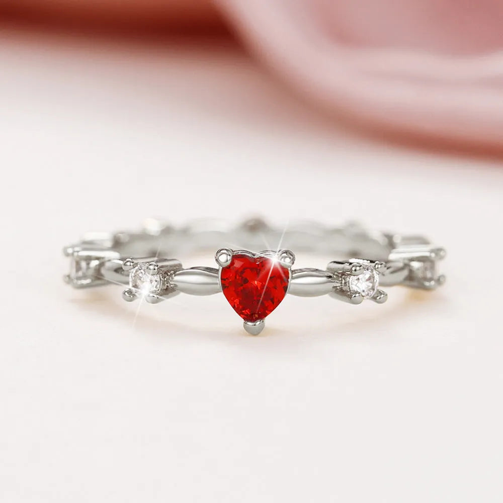 Gold or silver electroplated peach heart ring with zircon detailing on copper base