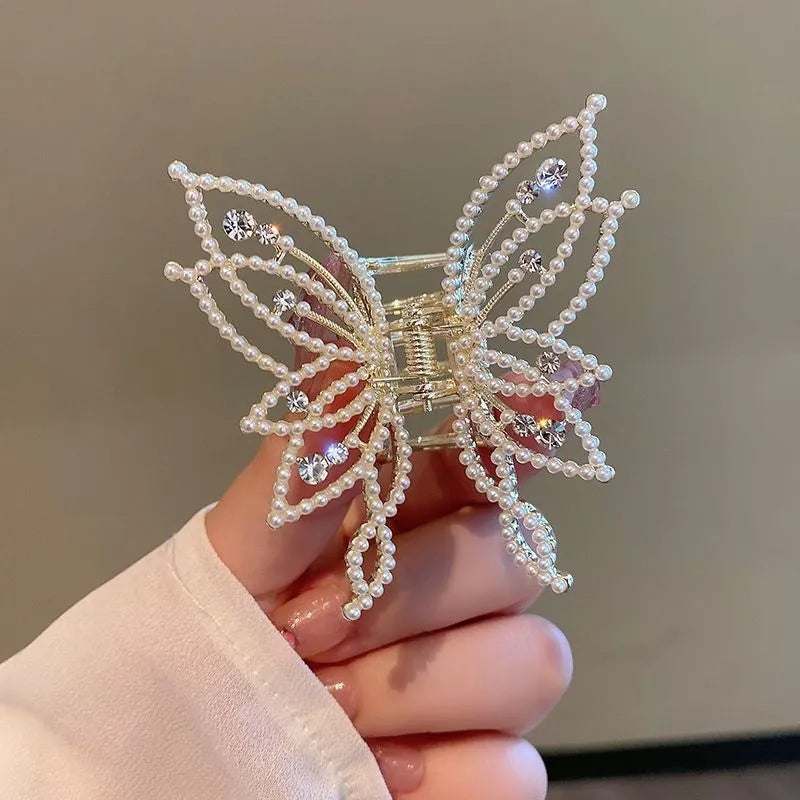 Butterfly-themed alloy hair clip barrette with electroplated finish, either rhinestone or pearl decorative style