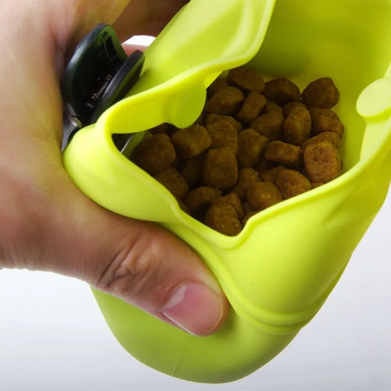 A silicone pet treat waist bag with a clip and magnetic flap closure in various colours.