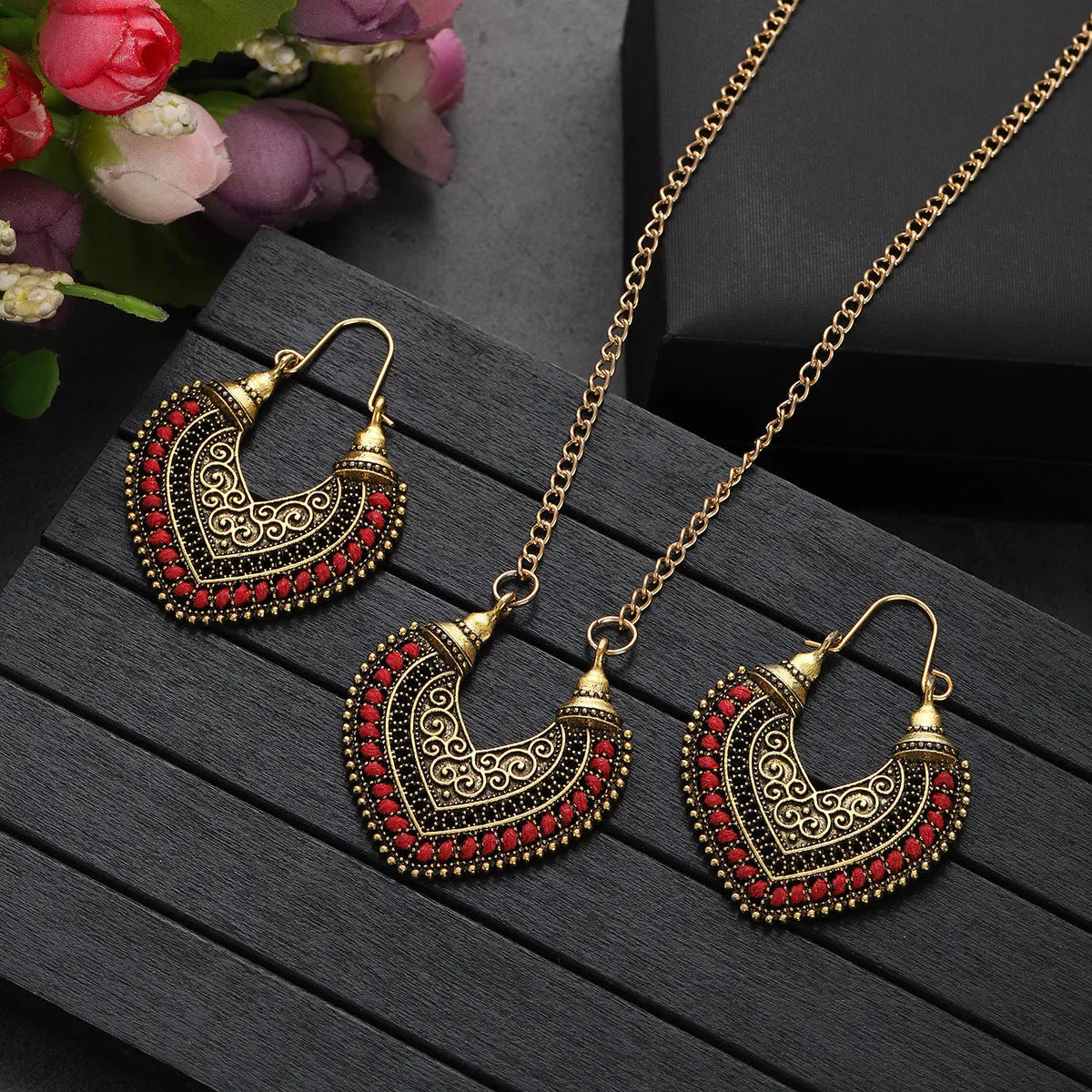 Rope winding heart-shaped earrings and matching necklace set with electroplated alloy pendants, shown in one of five colours