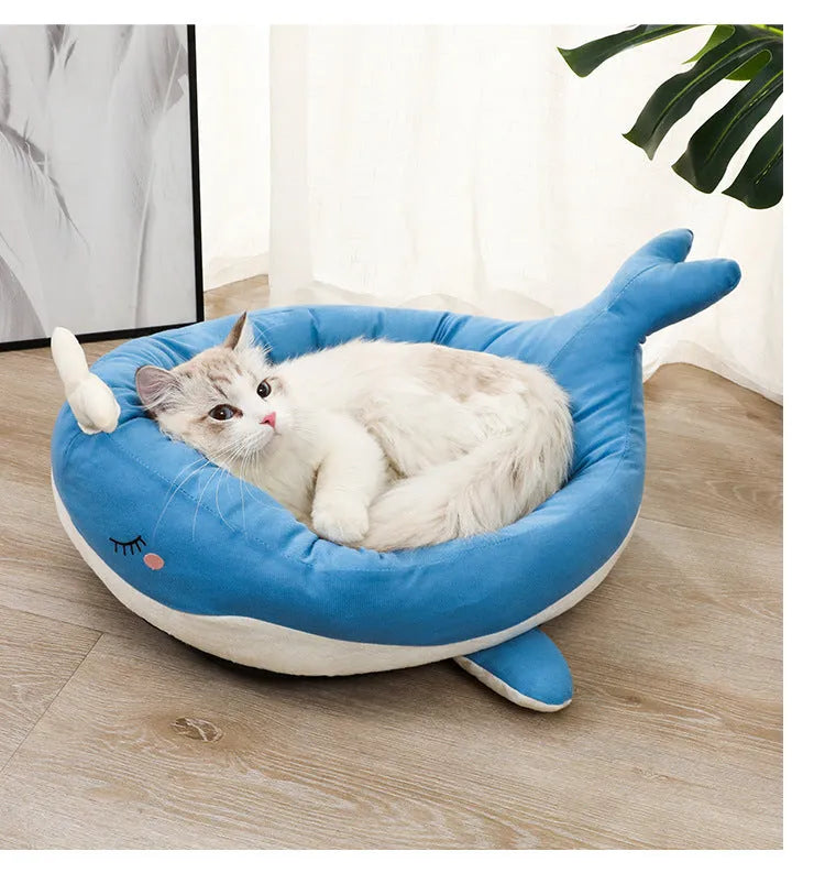 Blue duck-shaped soft polyester pet bed sofa for small dogs and cats on a wooden floor.