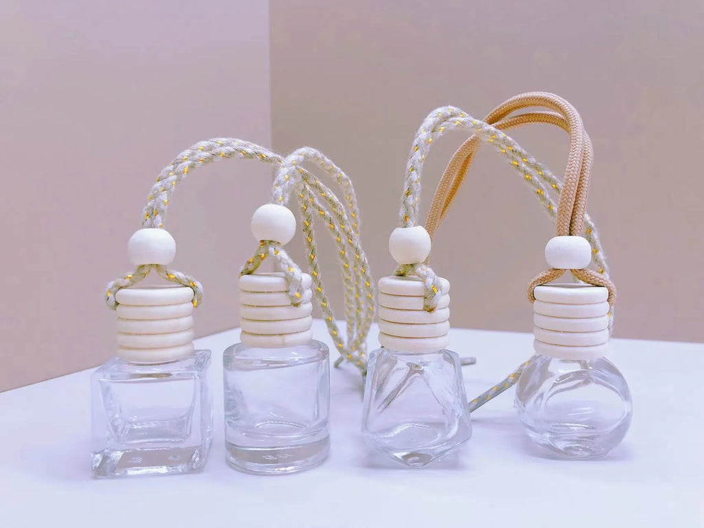 Car perfume pendant in glass with four style options for vehicle air freshening