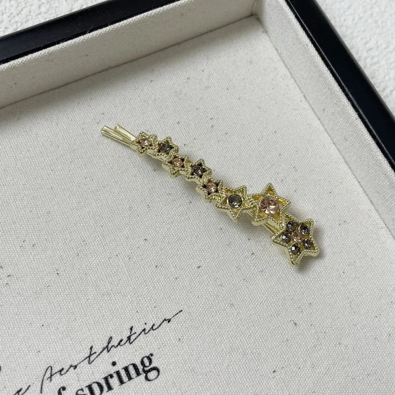 Gold electroplated Korean style barrette with five-pointed star rhinestone design for hair