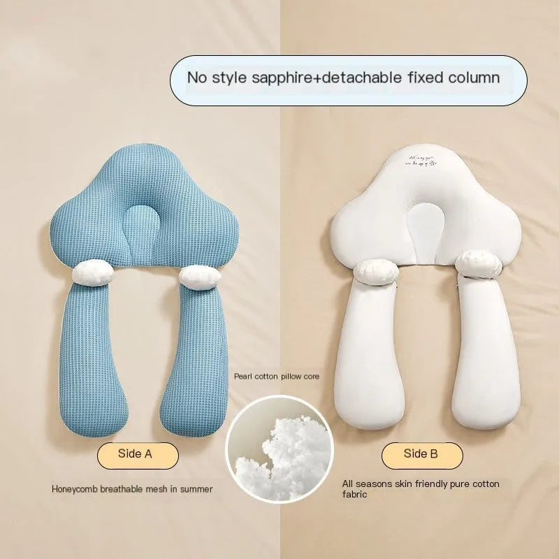 Blue and white U-shaped baby head shaping pillow made of pure cotton on a neutral background.