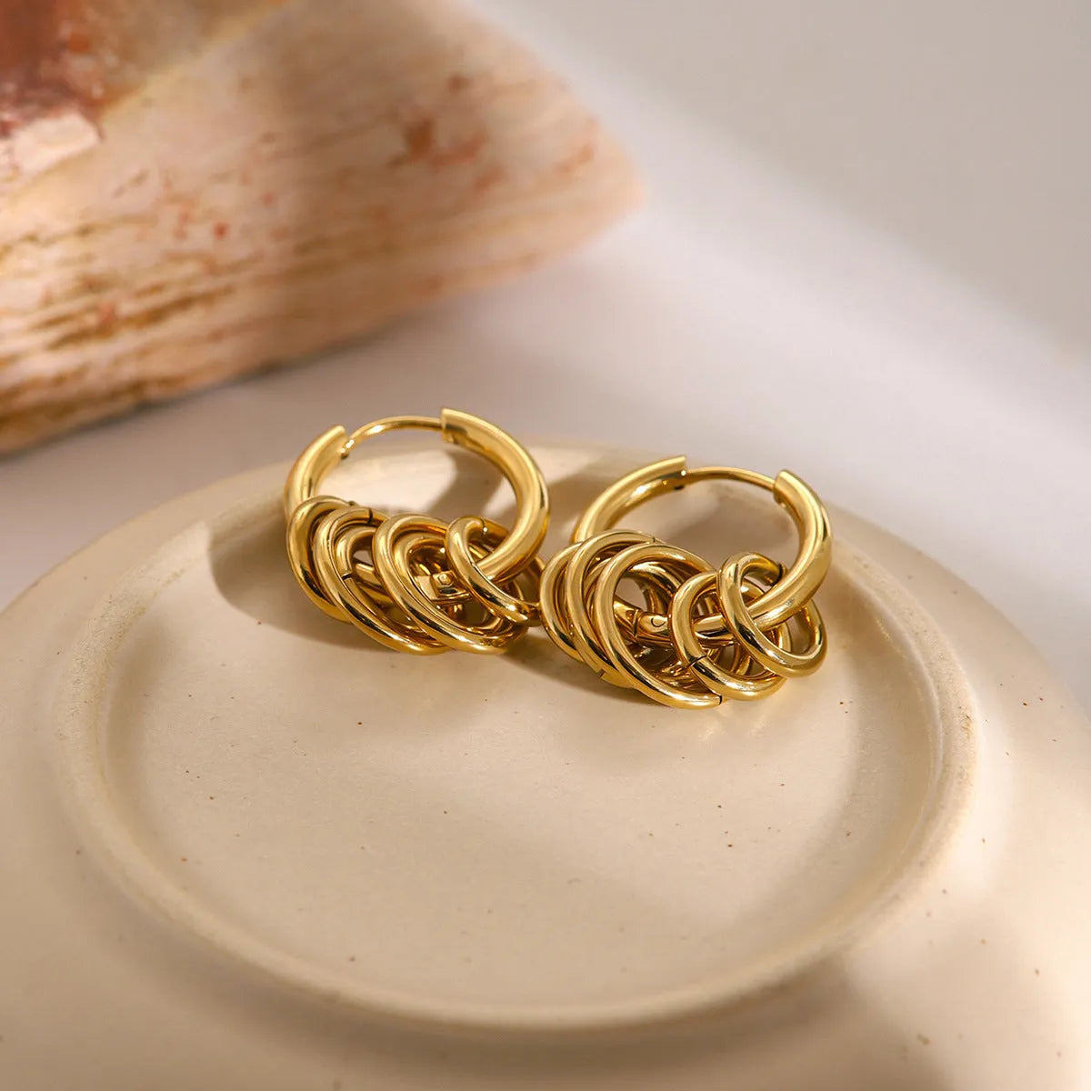 Pair of unisex stainless steel earrings with electroplated finish in ins style
