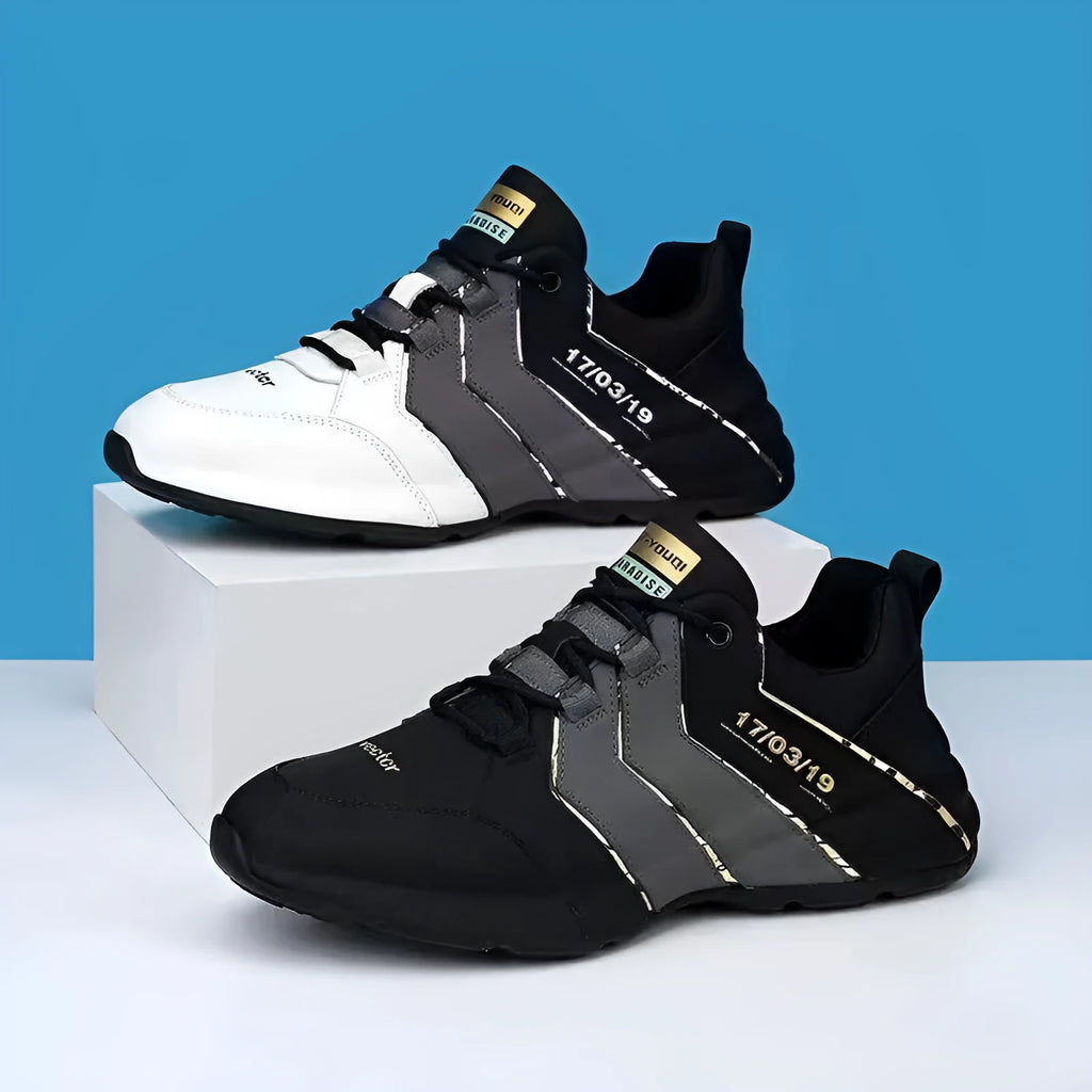 Casual low-top trainers for teenagers with thick plastic sole and mesh lining in grey and black colourway.