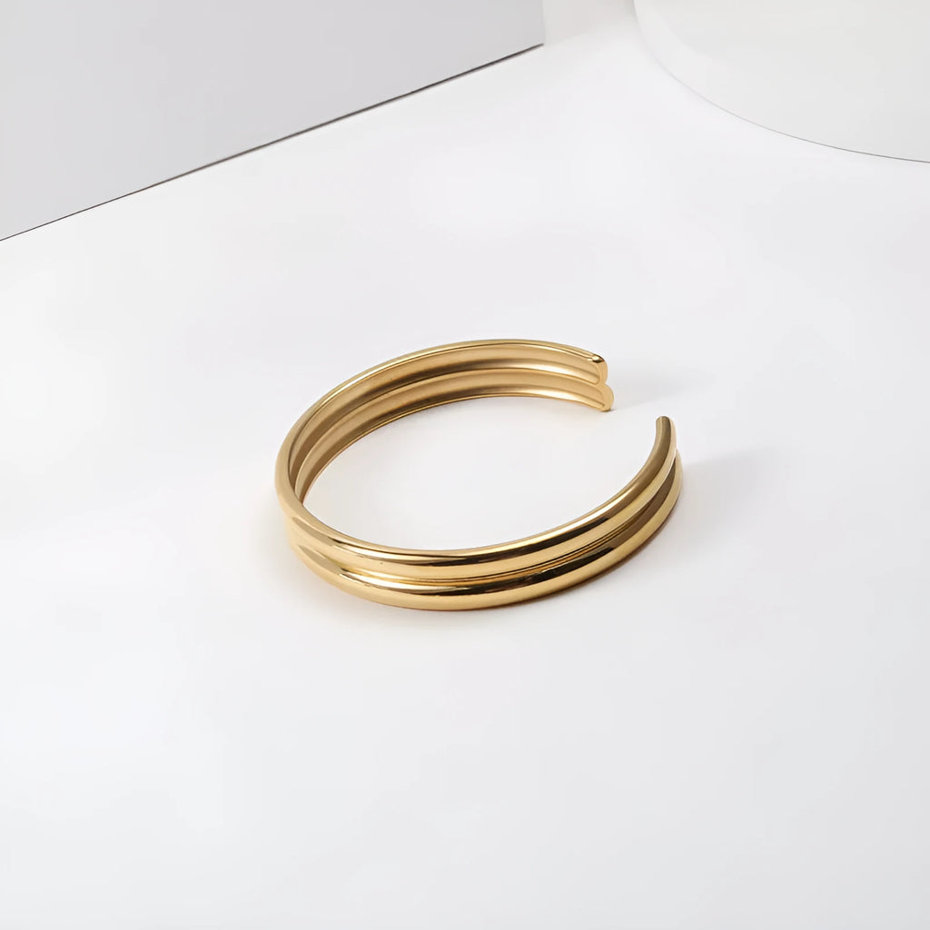 Double curved titanium steel bracelet for women, gold with pearl inlay, geometric style