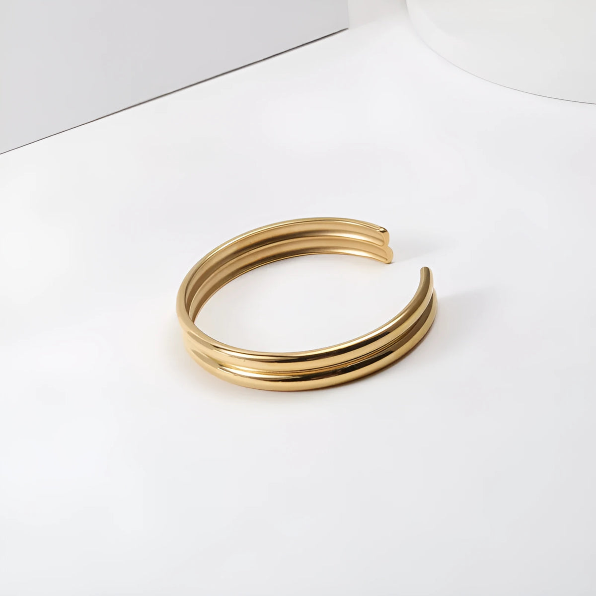Double curved titanium steel bracelet for women, gold with pearl inlay, geometric style