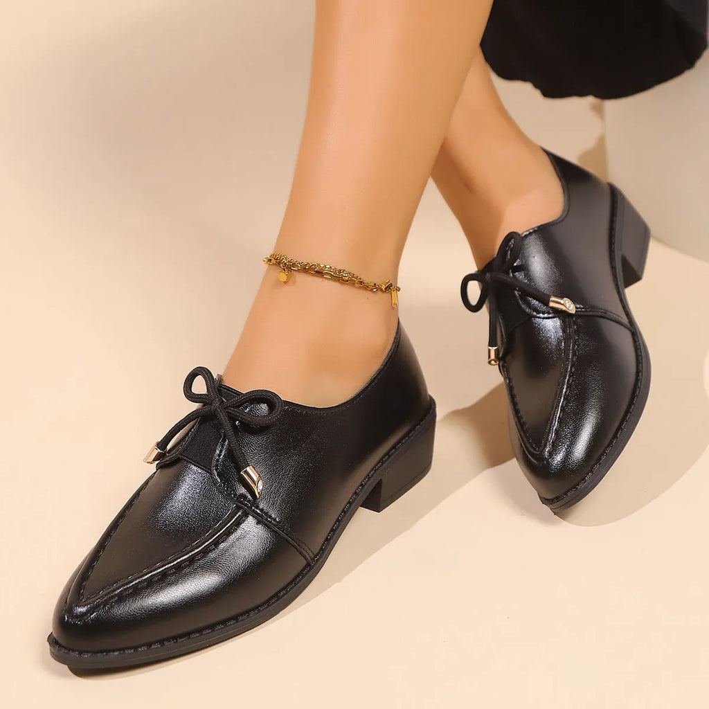 Women's British-style leather flats with bow decoration on pointed toe, showing three bow style options